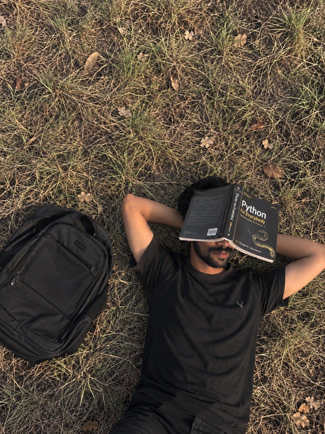 Banoth Sandeep Naik (MrBanoth) with the book Python for Everybody